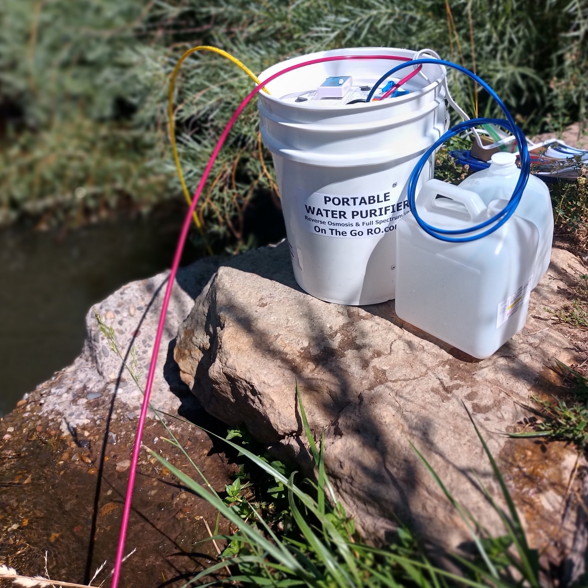 Photo purifying water from stream